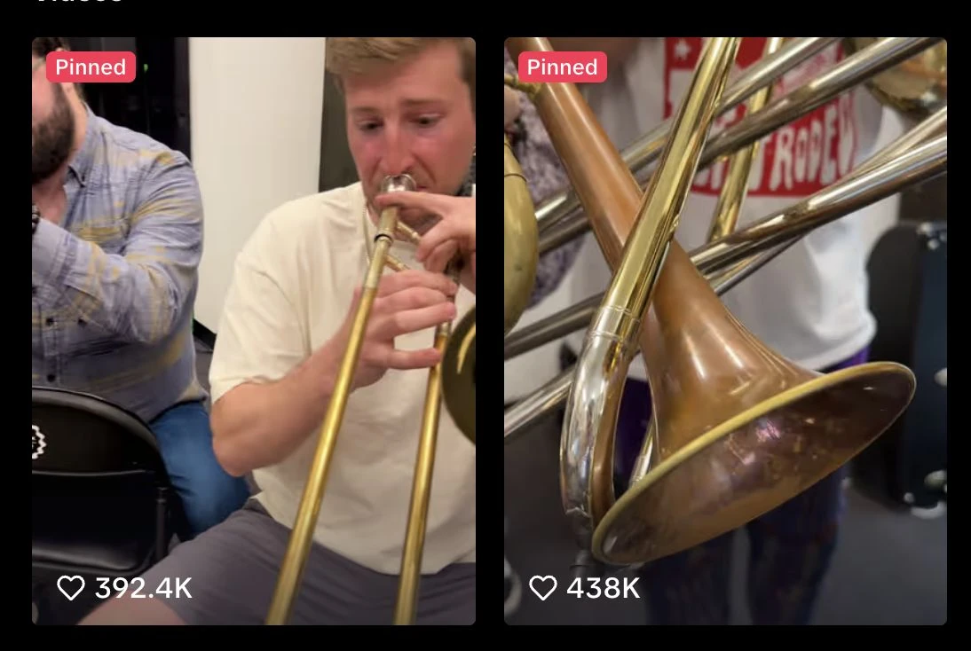 Big Wy's Brass Band pinned videos with 392.4K and 438K likes
